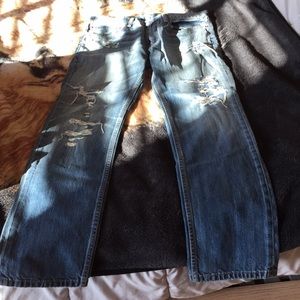Men’s “ripped look” Levi blue jeans